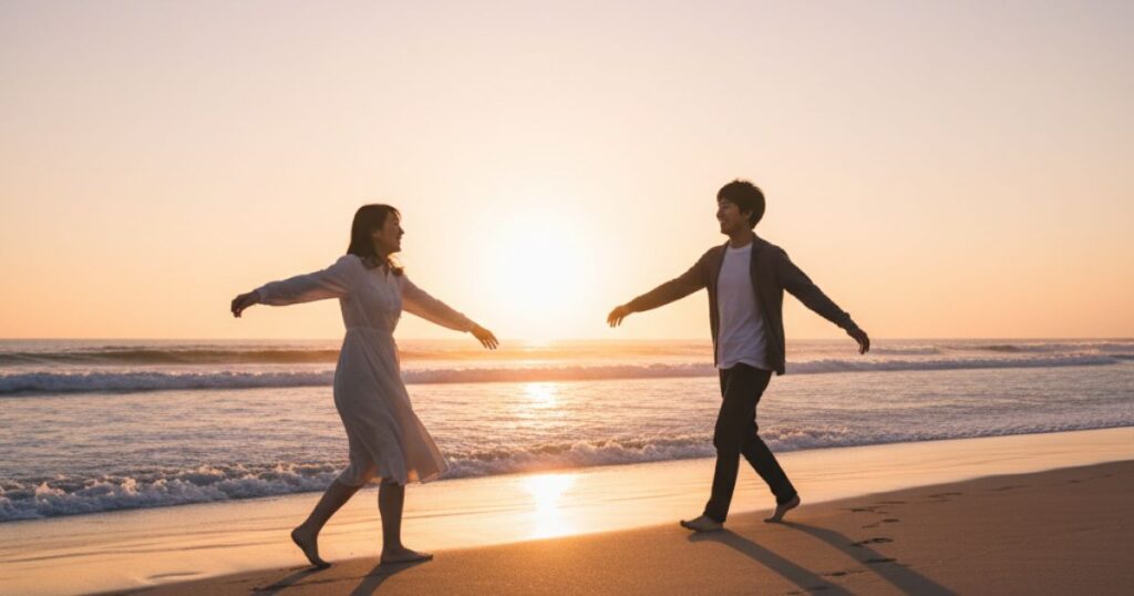 魂の統合を果たし再会したツインレイのカップルが夕日の中で歩み寄る様子


再試行こ